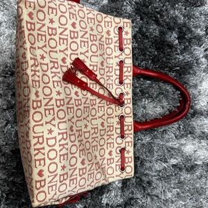 Tan and red Dooney & Burke handbag slightly used